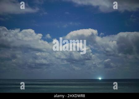 Boat passing British Channel under the Moon light 1-2 Stock Photo