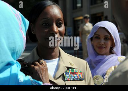Washington, DC, USA. 22nd July, 2010. The 2009 U.S. Pacific Fleet Sea Sailor of the Year Petty Officer 1st Class Samira McBride, operations specialist, is meritoriously promoted to chief petty officer at an advancement ceremony at the Navy Memorial. McBride is one of four sailors selected for Sailor of the Year and this marks the first time in history all Sailors of the Year are women. Credit: U.S. Navy/ZUMA Press Wire Service/ZUMAPRESS.com/Alamy Live News Stock Photo