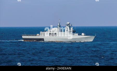 220310-N-SP805-0003 BALTIC SEA (March 10, 2022) Polish offshore patrol vessel ORP Ślązak (241) participates in maneuvering drills with Arleigh Burke-class guided-missile destroyers USS Forrest Sherman (DDG 98) and USS Donald Cook (DDG 75), along with Polish Oliver Hazard Perry-class guided-missile frigate ORP Generał Kazimierz Pułaski (FFG 272), March 10. USS Forrest Sherman (DDG 98) is deployed to the European theater of operations and participating in a range of maritime activities in support of U.S. Sixth Fleet and NATO Allies. (U.S. Navy photo by Lt. j. g. Kathleen Barrios) Stock Photo