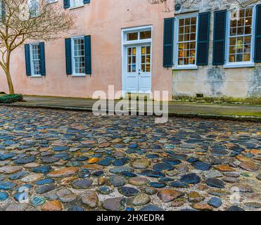 Pre Colonial Architecture and Cobblestone Paved Chalmers Street in The Historic District, Charleston, South Carolina, USA Stock Photo