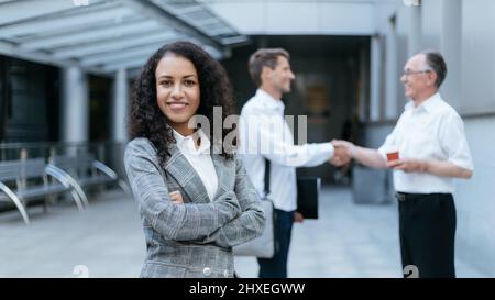 confident businesswoman standing in the lobby of a business center. Stock Photo