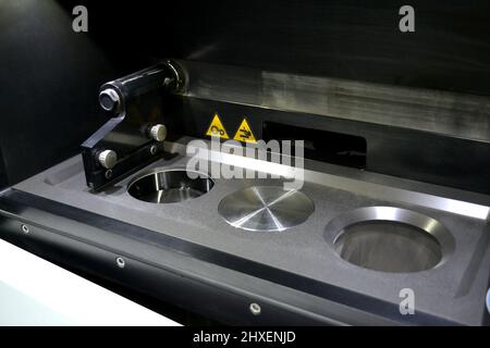 Open working chamber of a laser sintering machine for metal Stock Photo