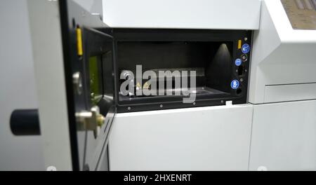 Open working chamber of a laser sintering machine for metal Stock Photo