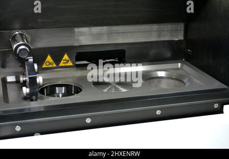 Open working chamber of a laser sintering machine for metal Stock Photo