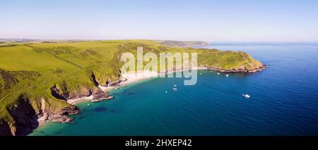 Aerial view of the stunning coastline and beach at Lantic Bay. Crystal clear turquoise sea water in Cornwall, England. Stock Photo