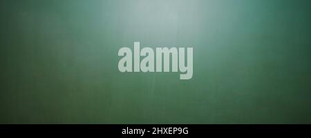 Blank green chalkboard, blackboard texture, banner size, panorama, with copyspace for your individual text. Stock Photo