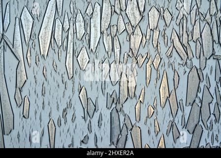 Detail of paint peeling off of a metal surface Stock Photo