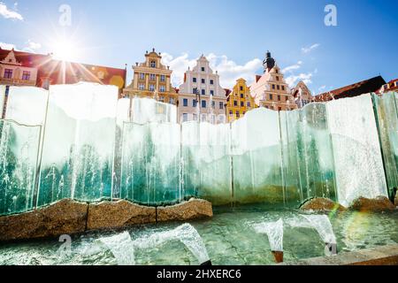 Fantastic view of the ancient homes on a sunny day. Gorgeous and picturesque scene. Location famous Market Square in Wroclaw, Poland, Europe. Historic Stock Photo