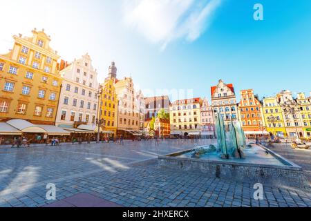 Fantastic view of the ancient homes on a sunny day. Gorgeous and picturesque scene. Location famous Market Square in Wroclaw, Poland, Europe. Historic Stock Photo