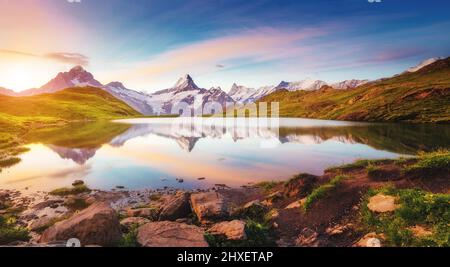 Great view of Mt. Schreckhorn and Wetterhorn above Bachalpsee lake . Dramatic and picturesque scene. Location place Swiss alps, Bernese Oberland, Grin Stock Photo