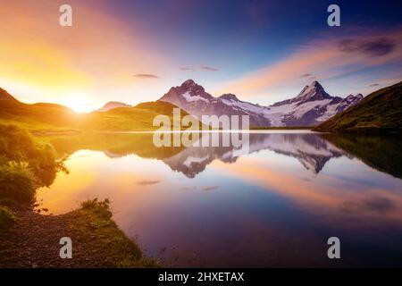 Great view of Mt. Schreckhorn and Wetterhorn above Bachalpsee lake . Dramatic and picturesque scene. Location place Swiss alps, Bernese Oberland, Grin Stock Photo