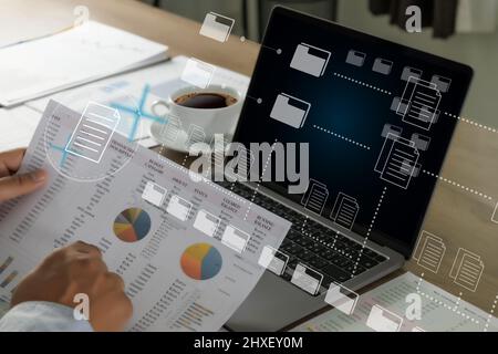 Document Management System (DMS) Businessman working manage files documentation Stock Photo