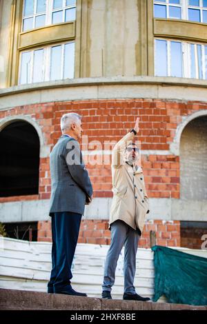 Amazing two senior businessmen are talking about the company new plans Stock Photo