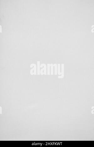 Close up white background plate with textile texture detail on it. Stock Photo