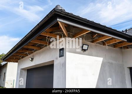 The light for the motion sensor mounted on the facade of the