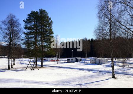 Winter camping ground with caravans in the winter Stock Photo