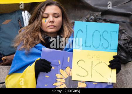 Manchester, UK. 12th Mar 2022. Protesters gather in Manchester city centre, UK, to protest about the war in Ukraine. Protestors are calling for a stop to the war and the introduction of a no fly Zone by NATO. Picture garyroberts/worldwidefeatures.com Credit: GaryRobertsphotography/Alamy Live News Stock Photo