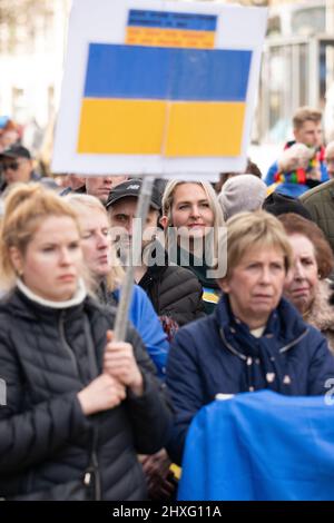 Manchester, UK. 12th Mar 2022. Protesters gather in Manchester city centre, UK, to protest about the war in Ukraine. Protestors are calling for a stop to the war and the introduction of a no fly Zone by NATO. Picture garyroberts/worldwidefeatures.com Credit: GaryRobertsphotography/Alamy Live News Stock Photo