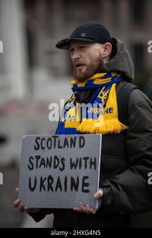 Glasgow, UK, 12 March 2022. Stand With Ukraine rally in George Square, showing support for Ukraine in their current war with President PutinÕs Russia, in Glasgow, Scotland, 12 March 2022. Photo credit: Jeremy Sutton-Hibbert/ Alamy Live News. Stock Photo