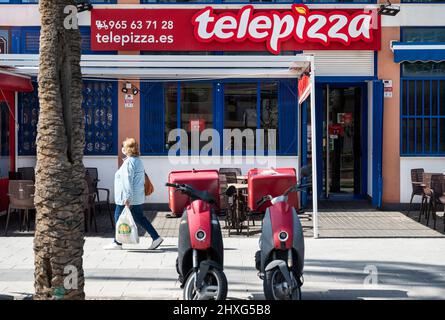Alicante, Spain. 11th Mar, 2022. A pedestrian walks past the Spanish fast-food restaurant chain of Telepizza in Spain. (Photo by Xavi Lopez/SOPA Images/Sipa USA) Credit: Sipa USA/Alamy Live News Stock Photo