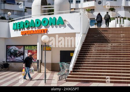 Alicante, Spain. 11th Mar, 2022. A shopper is seen holding groceries as he leaves the Spanish supermarket chain, Mercadona, in Spain. (Photo by Xavi Lopez/SOPA Images/Sipa USA) Credit: Sipa USA/Alamy Live News Stock Photo