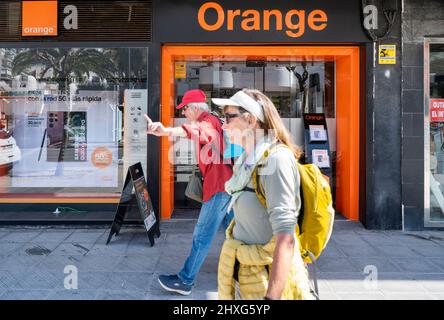 Alicante, Spain. 11th Mar, 2022. Pedestrians walk past the French multinational telecommunications corporation and phone operator, Orange S.A., store seen in Spain. (Photo by Xavi Lopez/SOPA Images/Sipa USA) Credit: Sipa USA/Alamy Live News Stock Photo