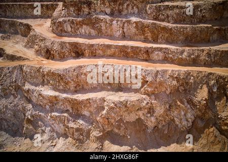 Ledges of open pit sand quarry Stock Photo