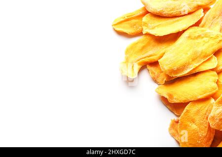 Organic dried mango fruit slices isolated on white background Stock Photo