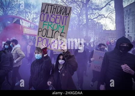 London, UK. 12th March 2022. Sarah Everard one year on protest. Protesters from Sisters Uncut join with other anti-police activists to protest march from New Scotland Yard police HQ one year on from the controversial Clapham Common vigil arrests. Protesters are demanding consent be withdrawn from policing and the full removal of the Policing Powers Bill currently being debated in the Commons. Credit: Guy Corbishley/Alamy Live News Stock Photo