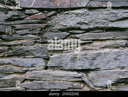 Stone and clay wall texture. Stone background with clay. Stock Photo