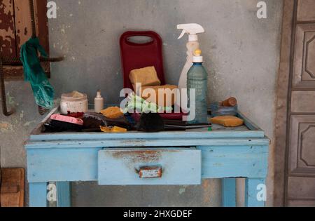 Hair salon supplies on a table at an empty barber shop in Trinidad, Cuba. Stock Photo