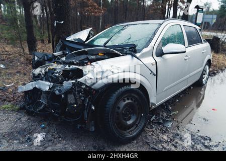 Destroyed front bumper of a passenger car Warsaw outskirts Poland . High quality photo Stock Photo