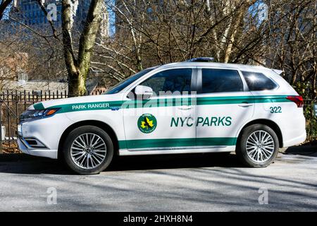 NYC Parks park ranger plug-in hybrid ev vehicle parked outdoors in Central Park. - New York, USA - February, 2022 Stock Photo