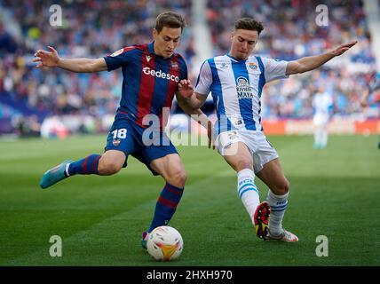 Valencia, Spain. 12th Mar, 2022. Espanyol's Adria Pedrosa (R) vies with Jorge de Frutos during a La Liga match between Levante UD and RCD Espanyol in Valencia, Spain, March 12, 2022. Credit: Pablo Morano/Xinhua/Alamy Live News Stock Photo