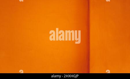 Orange cement surface, abstract pattern, the background can be used as screen saver, wall paper or background with copy space. Stock Photo
