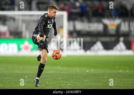 Washington, DC, USA. 12th Mar, 2022. D.C. United defender Julian Gressel (31) controls the ball during the MLS match between the Chicago Fire and the DC United at Audi Field in Washington, DC. Reggie Hildred/CSM/Alamy Live News Stock Photo