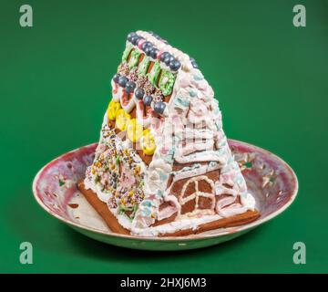 Traditional ginger bread house on a plate Stock Photo