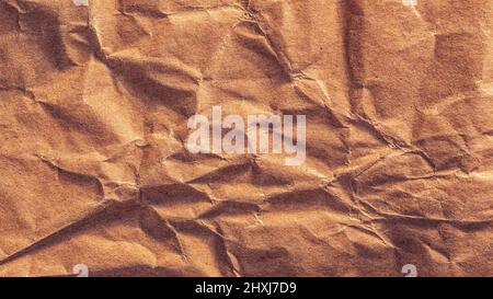 Close-up of crumpled kraft paper texture Stock Photo