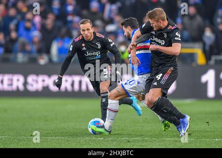 Luigi Ferraris stadium, Genova, Italy, March 12, 2022, Henrique Ramos De Oliveira Melo Arthur (Juventus) - Francesco Caputo  (Sampdoria) - Matthijs De Stock Photo