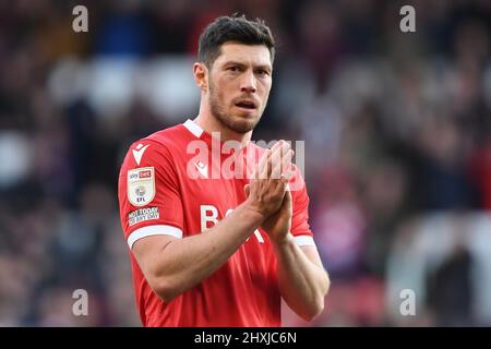 NOTTINGHAM, UK. MAR 12TH  Scott McKenna of Nottingham Forest celebrates victory during the Sky Bet Championship match between Nottingham Forest and Reading at the City Ground, Nottingham on Saturday 12th March 2022. (Credit: Jon Hobley | MI News) Stock Photo