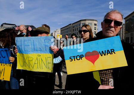 Brussels, Belgium. 13th Mar, 2022. Ukrainian supporters take part in a protest against Russian invasion of Ukraine at Carrefour of Europe in Credit: ALEXANDROS MICHAILIDIS/Alamy Live News Stock Photo