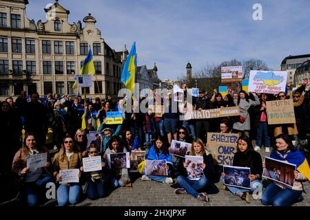 Ukrainian supporters take part in a protest against Russian invasion of Ukraine at Carrefour of Europe in Brussels, Belgium. 13th Mar, 2022. Credit: ALEXANDROS MICHAILIDIS/Alamy Live News Stock Photo