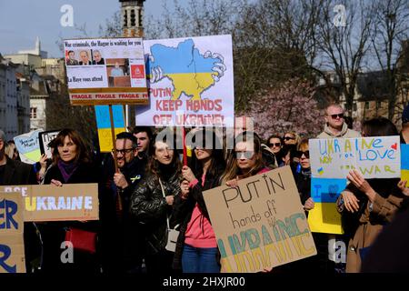 Ukrainian supporters take part in a protest against Russian invasion of Ukraine at Carrefour of Europe in Brussels, Belgium. 13th Mar, 2022. Credit: ALEXANDROS MICHAILIDIS/Alamy Live News Stock Photo