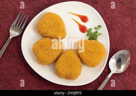 Heart Shaped Veg Paneer Cutlet Tikki With Bhujia Sev Coating Made Of Indian Cottage Cheese Crumbled Panir Spices Maida Green Vegetables Like Carrot Stock Photo