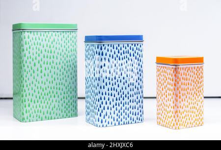 Set of tin cans for spices and bulk products. Bright metal cans. Stock Photo