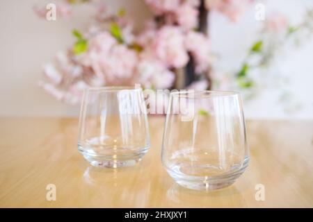 close up of empty drinking glasses on table  Stock Photo