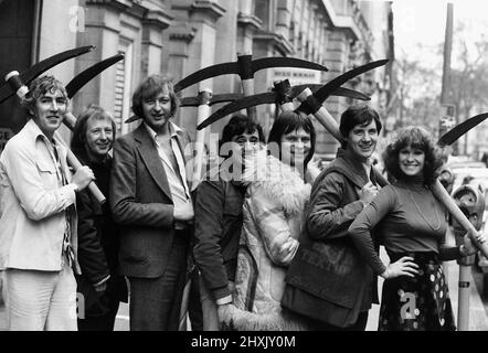 Monty Pythons Flying Circus cast Peter Cook. Tim Brooke Taylor, Graeme Chapman, Terry Jones, Terry Gilliam, Michael Palin and Carol Cleveland outside Her Majestys Theatre London 1976 Stock Photo