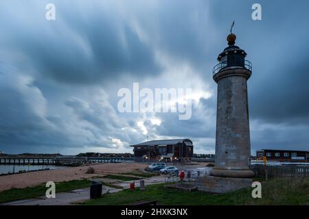 Stormy skies over Kingston Lighthouse in Shoreham-by-Sea, West Sussex, England. Stock Photo