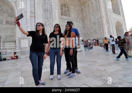 New Delhi, India. 13th Mar, 2022. Tourists and residents visit the Taj Mahal in Agra Uttar Pradesh, India on March 13, 2022. (Photo by Ravi Batra/Sipa USA) Credit: Sipa USA/Alamy Live News Stock Photo