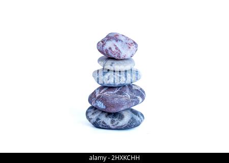 Stack of pebble stones. Pebble stones isolated on white background. Stock Photo